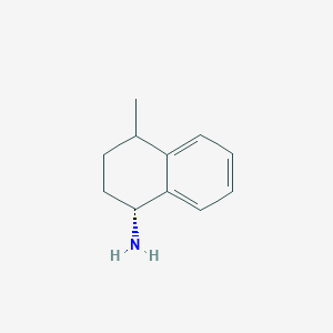 molecular formula C11H15N B13263516 (1R)-4-methyl-1,2,3,4-tetrahydronaphthalen-1-amine 