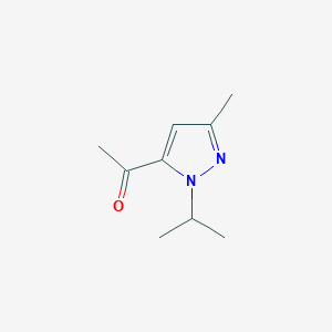 molecular formula C9H14N2O B13263720 1-[3-Methyl-1-(propan-2-yl)-1H-pyrazol-5-yl]ethan-1-one 