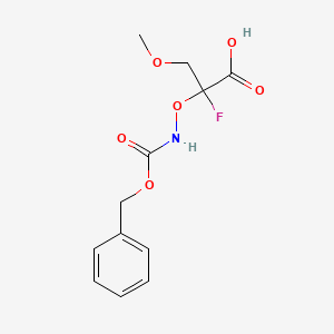 molecular formula C12H14FNO6 B13263866 2-({[(Benzyloxy)carbonyl]amino}oxy)-2-fluoro-3-methoxypropanoic acid 