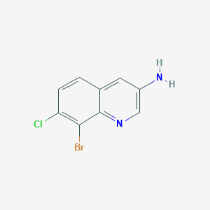molecular formula C9H6BrClN2 B13264247 8-Bromo-7-chloroquinolin-3-amine 