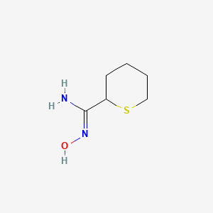 molecular formula C6H12N2OS B13264951 N'-Hydroxythiane-2-carboximidamide 