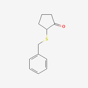 molecular formula C12H14OS B13265517 2-(Benzylsulfanyl)cyclopentan-1-one 
