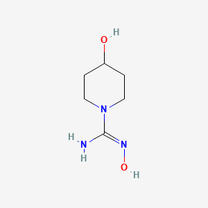 molecular formula C6H13N3O2 B13265569 N',4-dihydroxypiperidine-1-carboximidamide 