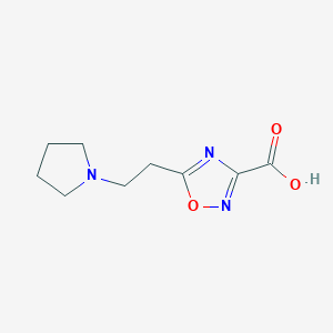 molecular formula C9H13N3O3 B13265712 5-[2-(Pyrrolidin-1-yl)ethyl]-1,2,4-oxadiazole-3-carboxylic acid 