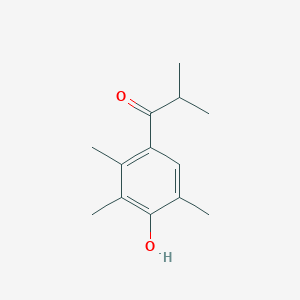 molecular formula C13H18O2 B13266518 1-(4-Hydroxy-2,3,5-trimethylphenyl)-2-methylpropan-1-one 