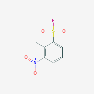 molecular formula C7H6FNO4S B13266532 2-Methyl-3-nitrobenzene-1-sulfonyl fluoride 