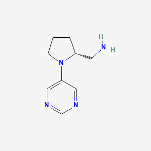molecular formula C9H14N4 B13266540 1-[(2R)-1-(5-Pyrimidinyl)-2-pyrrolidinyl]methanamine 