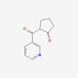 molecular formula C11H11NO2 B13266547 2-(Pyridine-3-carbonyl)cyclopentan-1-one 