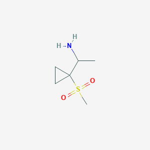 molecular formula C6H13NO2S B13267179 1-(1-Methanesulfonylcyclopropyl)ethan-1-amine 