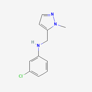 molecular formula C11H12ClN3 B13267220 3-Chloro-N-[(1-methyl-1H-pyrazol-5-yl)methyl]aniline 