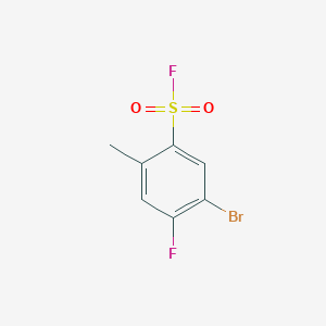 molecular formula C7H5BrF2O2S B13267303 5-Bromo-4-fluoro-2-methylbenzene-1-sulfonyl fluoride 