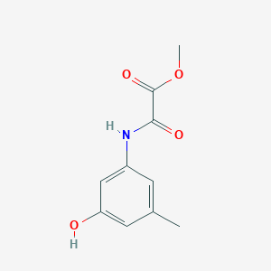 molecular formula C10H11NO4 B13268472 Methyl [(3-hydroxy-5-methylphenyl)carbamoyl]formate 