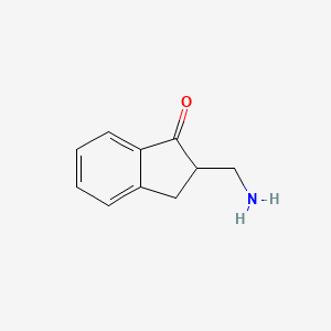 molecular formula C10H11NO B13270314 2-(Aminomethyl)-2,3-dihydro-1H-inden-1-one 