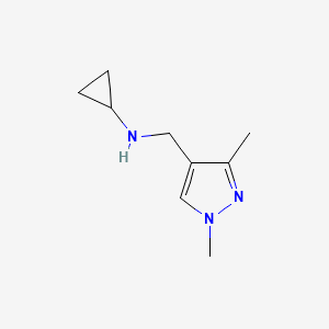 molecular formula C9H15N3 B1327108 N-[(1,3-dimethyl-1H-pyrazol-4-yl)methyl]cyclopropanamine CAS No. 1170202-73-9