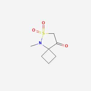 molecular formula C7H11NO3S B13277528 5-Methyl-6-thia-5-azaspiro[3.4]octan-8-one 6,6-dioxide 