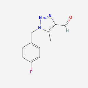 molecular formula C11H10FN3O B13278896 1-[(4-Fluorophenyl)methyl]-5-methyl-1H-1,2,3-triazole-4-carbaldehyde 