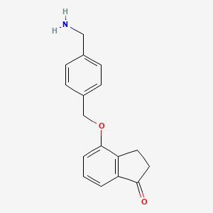 molecular formula C17H17NO2 B13279253 4-{[4-(aminomethyl)phenyl]methoxy}-2,3-dihydro-1H-inden-1-one 