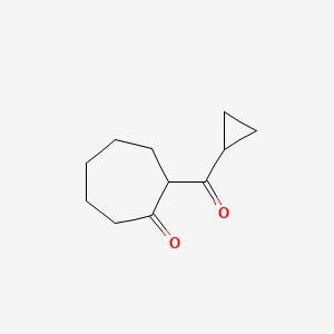 molecular formula C11H16O2 B13280198 2-Cyclopropanecarbonylcycloheptan-1-one 