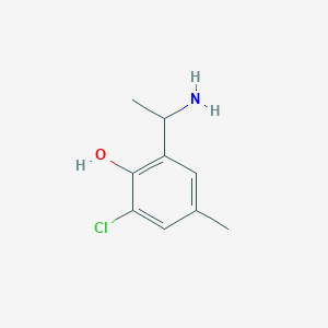 molecular formula C9H12ClNO B13281278 2-(1-Aminoethyl)-6-chloro-4-methylphenol 