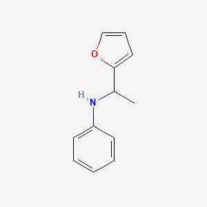 molecular formula C12H13NO B13286220 N-[1-(furan-2-yl)ethyl]aniline 