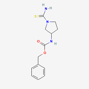 molecular formula C13H17N3O2S B13286819 Benzyl N-(1-carbamothioylpyrrolidin-3-yl)carbamate 