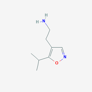 molecular formula C8H14N2O B13288175 2-[5-(Propan-2-yl)-1,2-oxazol-4-yl]ethan-1-amine 