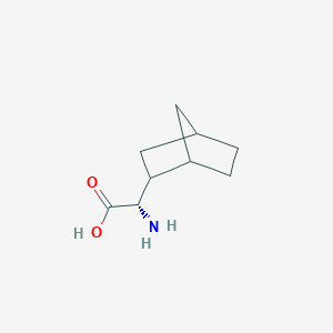 molecular formula C9H15NO2 B13292636 (2S)-2-Amino-2-{bicyclo[2.2.1]heptan-2-yl}acetic acid 