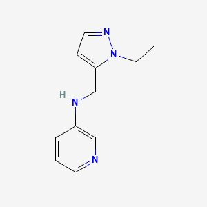 molecular formula C11H14N4 B13293392 N-[(1-Ethyl-1H-pyrazol-5-yl)methyl]pyridin-3-amine 