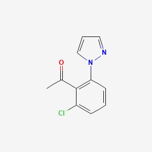 molecular formula C11H9ClN2O B13293441 1-[2-Chloro-6-(1H-pyrazol-1-yl)phenyl]ethan-1-one 