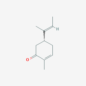 molecular formula C11H16O B13293444 (5R)-5-(But-2-en-2-yl)-2-methylcyclohex-2-en-1-one CAS No. 158249-62-8