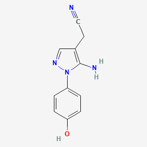 molecular formula C11H10N4O B13294316 2-[5-Amino-1-(4-hydroxyphenyl)-1H-pyrazol-4-yl]acetonitrile 