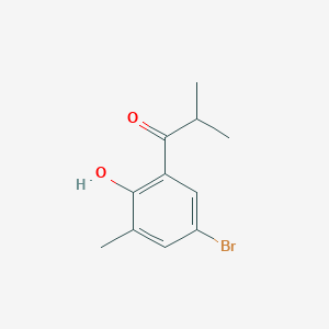 molecular formula C11H13BrO2 B13294850 1-(5-Bromo-2-hydroxy-3-methylphenyl)-2-methylpropan-1-one 