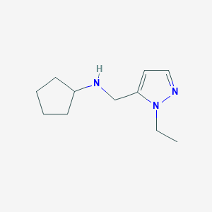 molecular formula C11H19N3 B13294891 N-[(1-Ethyl-1H-pyrazol-5-yl)methyl]cyclopentanamine 