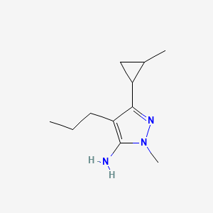 molecular formula C11H19N3 B13295459 1-Methyl-3-(2-methylcyclopropyl)-4-propyl-1H-pyrazol-5-amine 