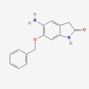 molecular formula C15H14N2O2 B13298701 5-Amino-6-(benzyloxy)-2,3-dihydro-1H-indol-2-one 