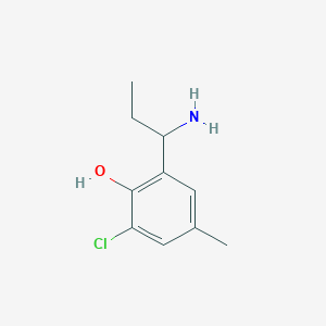 molecular formula C10H14ClNO B13299277 2-(1-Aminopropyl)-6-chloro-4-methylphenol 