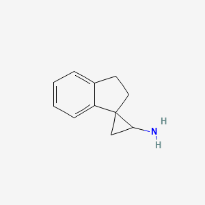 molecular formula C11H13N B13299380 2',3'-Dihydrospiro[cyclopropane-1,1'-indene]-3-amine 