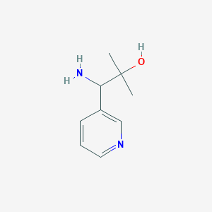 molecular formula C9H14N2O B13303971 1-Amino-2-methyl-1-(pyridin-3-yl)propan-2-ol 