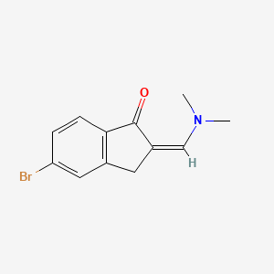 molecular formula C12H12BrNO B13305322 5-Bromo-2-[(dimethylamino)methylidene]-2,3-dihydro-1H-inden-1-one 