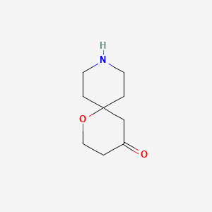 molecular formula C9H15NO2 B13305330 1-Oxa-9-azaspiro[5.5]undecan-4-one 