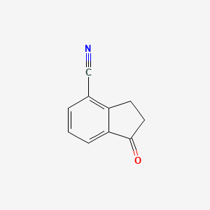molecular formula C10H7NO B1332841 1-Oxo-2,3-dihydro-1H-indene-4-carbonitrile CAS No. 60899-34-5