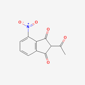 molecular formula C11H7NO5 B1333638 2-Acetyl-4-nitroindan-1,3-dione CAS No. 25125-04-6