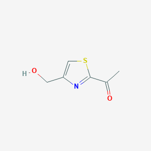 molecular formula C6H7NO2S B13339019 1-(4-(Hydroxymethyl)thiazol-2-yl)ethanone 