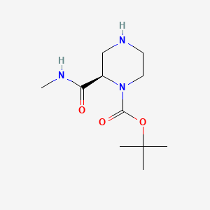 molecular formula C11H21N3O3 B13341492 tert-Butyl (R)-2-(methylcarbamoyl)piperazine-1-carboxylate 