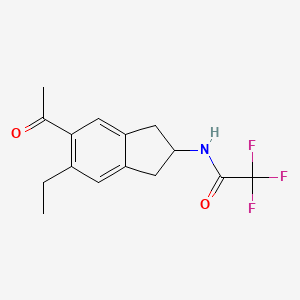 N-(5-acetyl-6-ethyl-2,3-dihydro-1H-inden-2-yl)-2,2,2-trifluoroacetamide