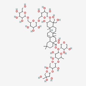 molecular formula C69H112O38 B13382679 [3-[5-[4-[3,4-Dihydroxy-4-(hydroxymethyl)oxolan-2-yl]oxy-3,5-dihydroxyoxan-2-yl]oxy-3,4-dihydroxy-6-methyloxan-2-yl]oxy-4,5-dihydroxyoxan-2-yl] 5,11-dihydroxy-9,9-bis(hydroxymethyl)-2,2,6a,6b,12a-pentamethyl-10-[3,4,5-trihydroxy-6-[[3,4,5-trihydroxy-6-[[3,4,5-trihydroxy-6-(hydroxymethyl)oxan-2-yl]oxymethyl]oxan-2-yl]oxymethyl]oxan-2-yl]oxy-1,3,4,5,6,6a,7,8,8a,10,11,12,13,14b-tetradecahydropicene-4a-carboxylate 