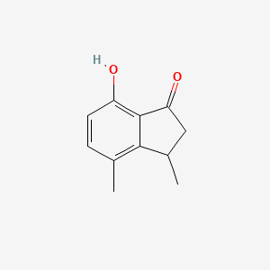 molecular formula C11H12O2 B1338443 7-Hydroxy-3,4-dimethylindan-1-one CAS No. 53005-72-4