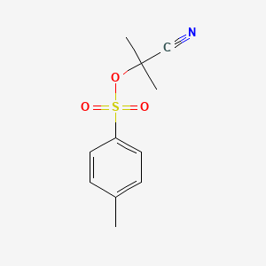 molecular formula C11H13NO3S B13410992 2-Methyl-2-[(4-methylbenzenesulfonyl)oxy]propanenitrile 