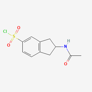 molecular formula C11H12ClNO3S B1342338 2-Acetamido-2,3-dihydro-1h-indene-5-sulfonyl chloride CAS No. 74124-92-8