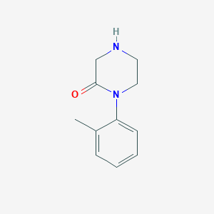 B134287 1-(2-Methylphenyl)piperazin-2-one CAS No. 150705-53-6